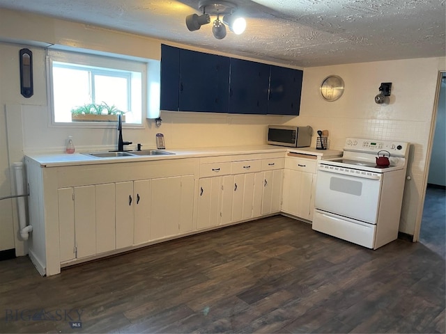 kitchen with dark wood-type flooring, sink, white electric range oven, and a textured ceiling