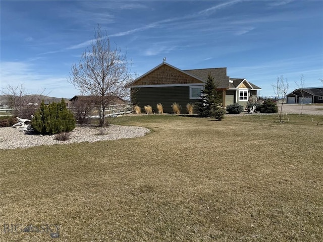 view of front of house featuring a front lawn