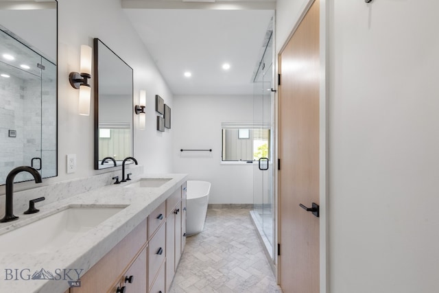 bathroom with tile patterned floors, double sink vanity, and an enclosed shower