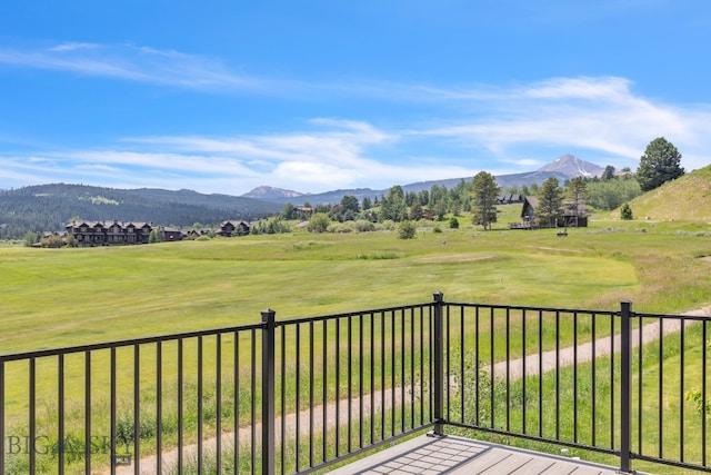 balcony featuring a mountain view