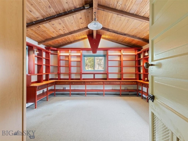 unfurnished office with wood ceiling, lofted ceiling with beams, and carpet