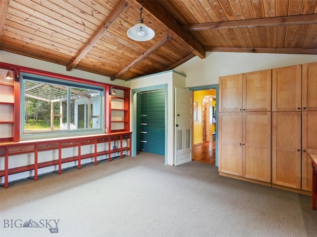 interior space with a baseboard radiator, vaulted ceiling with beams, wooden ceiling, and carpet flooring