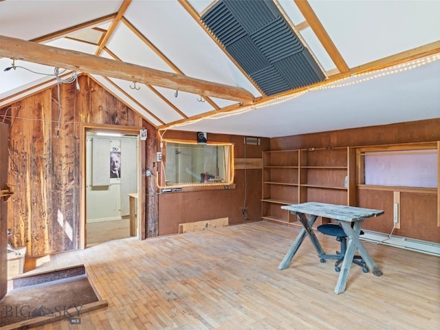 additional living space featuring vaulted ceiling with beams, built in shelves, wood-type flooring, and wood walls