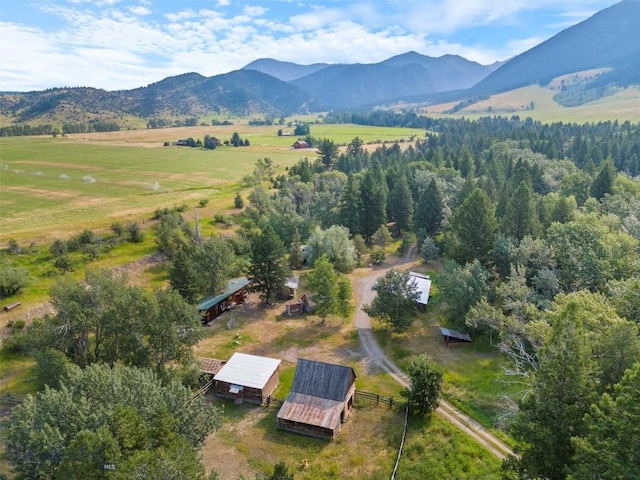 drone / aerial view with a mountain view and a rural view