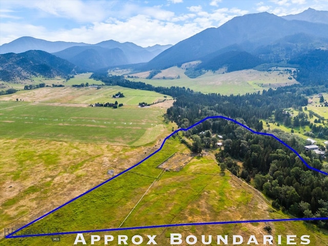 bird's eye view with a mountain view