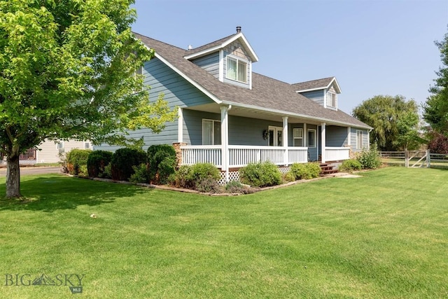 view of front facade with a front lawn and a porch