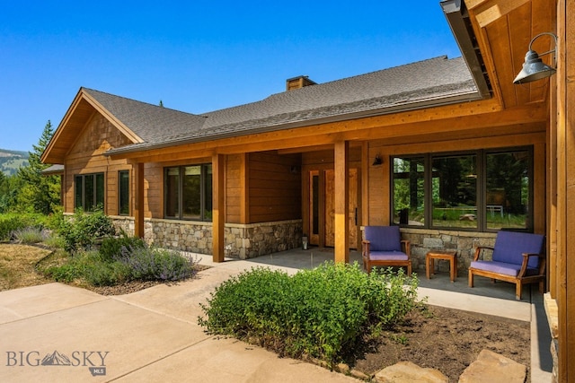 rear view of property with a patio area