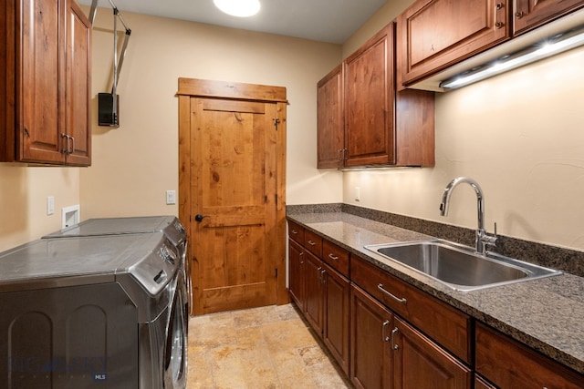 220 Watershed Rd, Big Sky, MT 59716 - clothes washing area with independent washer and dryer, cabinet space, and stone finish floors