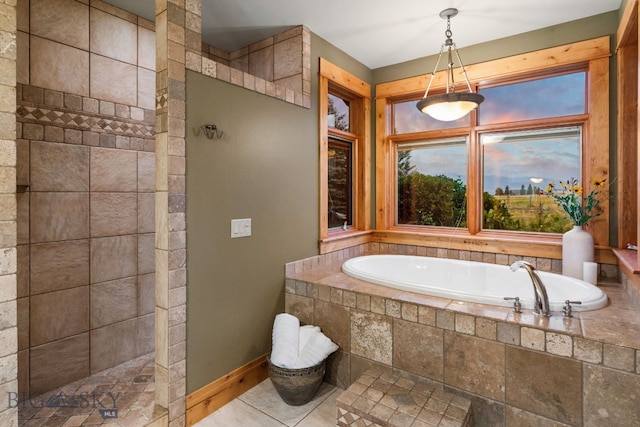 bathroom featuring plus walk in shower