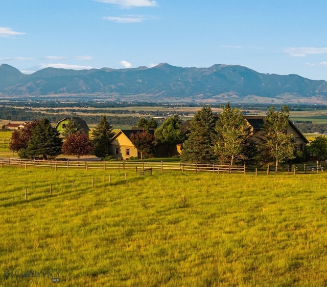 view of mountain feature with a rural view