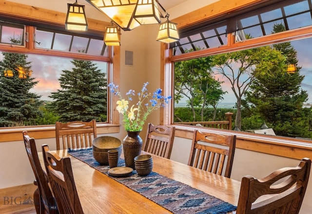 dining area with hardwood / wood-style floors