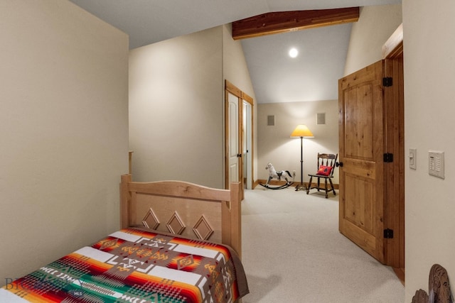 carpeted bedroom with vaulted ceiling with beams