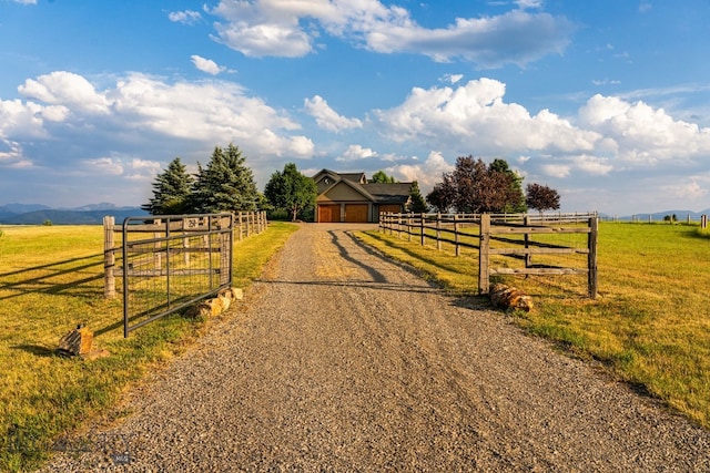 view of road featuring a mountain view and a rural view