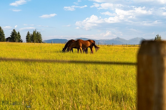 property view of mountains featuring a rural view