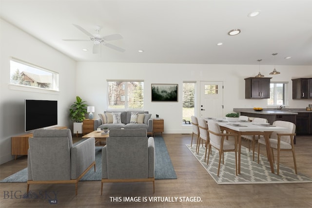 living room with sink, hardwood / wood-style floors, a wealth of natural light, and ceiling fan