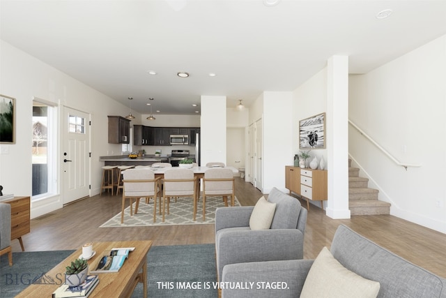 living room with light hardwood / wood-style floors