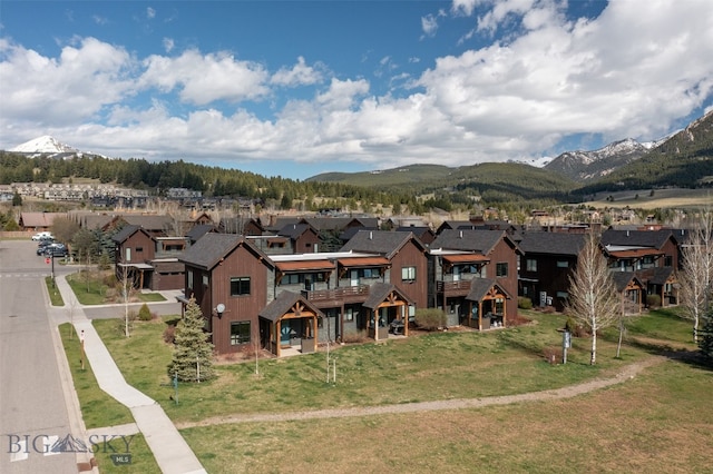 exterior space featuring a mountain view