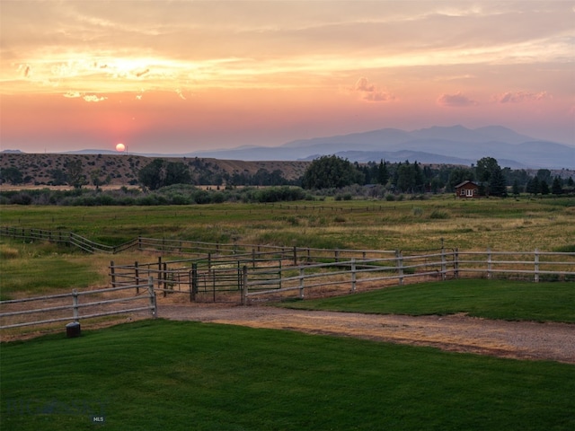 mountain view featuring a rural view