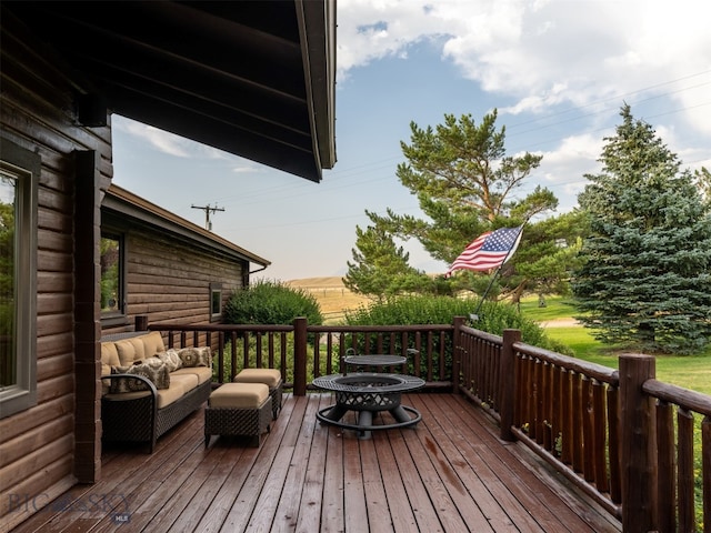 deck with an outdoor fire pit