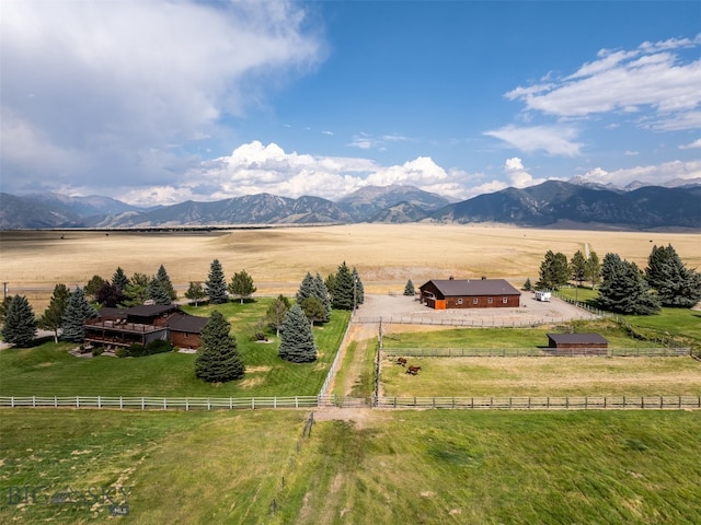 drone / aerial view with a mountain view and a rural view