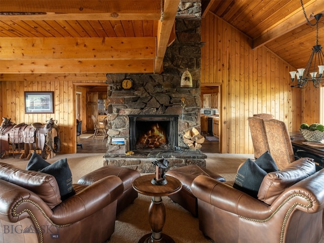 living room with wood walls, a fireplace, hardwood / wood-style floors, and wood ceiling