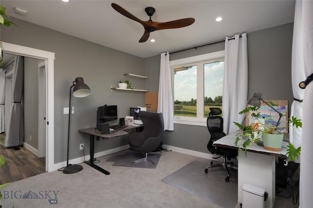 office space with ceiling fan and carpet flooring