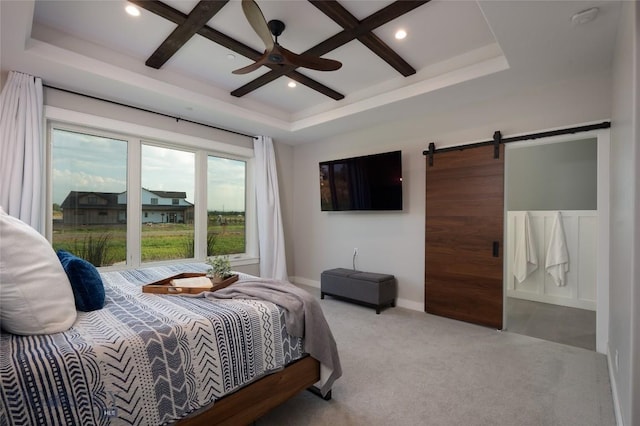 bedroom with beamed ceiling, a barn door, coffered ceiling, and light carpet