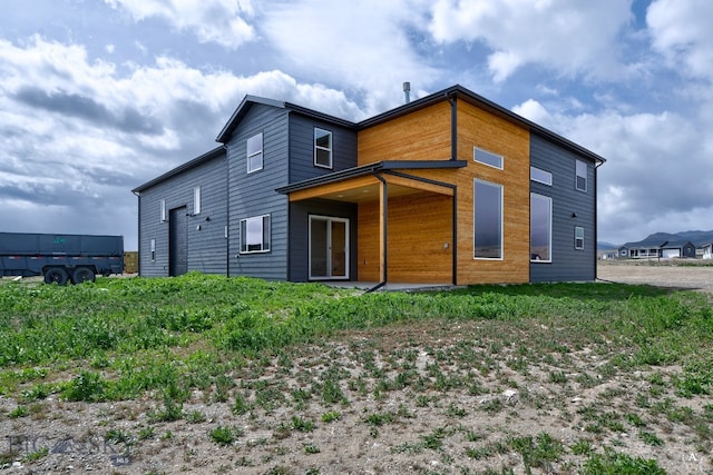 rear view of house featuring a patio area