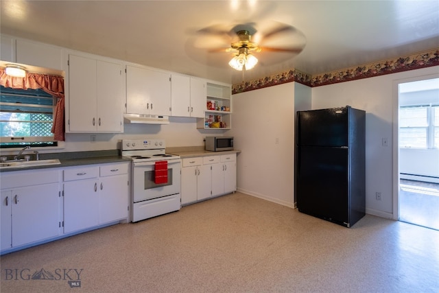 kitchen with electric stove, ceiling fan, black fridge, sink, and a baseboard radiator