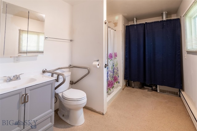 bathroom with a baseboard heating unit, toilet, and vanity