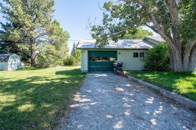 ranch-style house with a garage and a front lawn