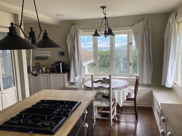 dining area with dark wood finished floors