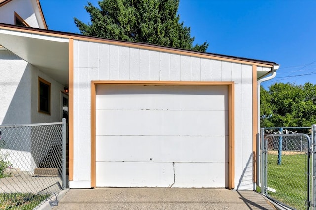 garage with fence