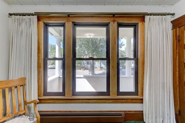 entryway featuring a baseboard radiator