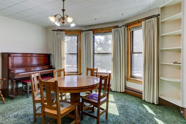 carpeted dining space featuring a chandelier