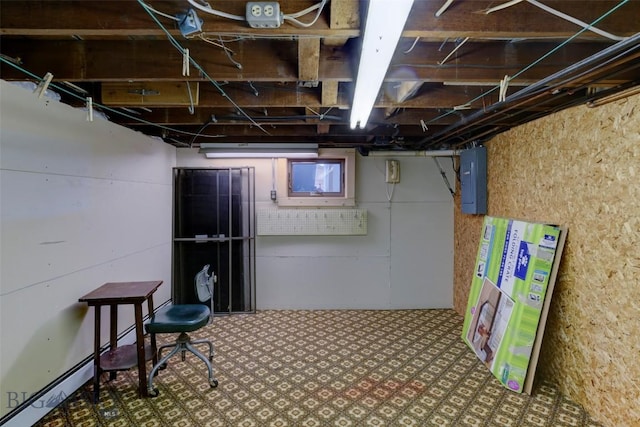 basement featuring electric panel and tile patterned floors