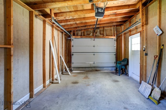 garage featuring a garage door opener