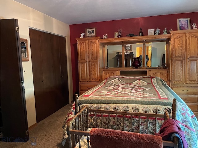 bedroom with a closet and carpet flooring