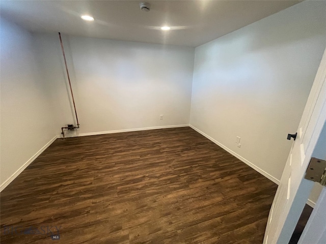 basement with dark wood-type flooring