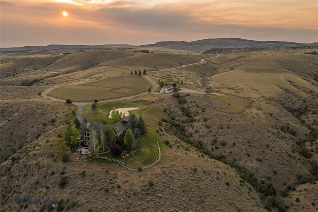 aerial view at dusk with a rural view