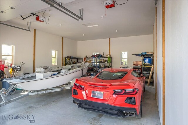 garage featuring a garage door opener