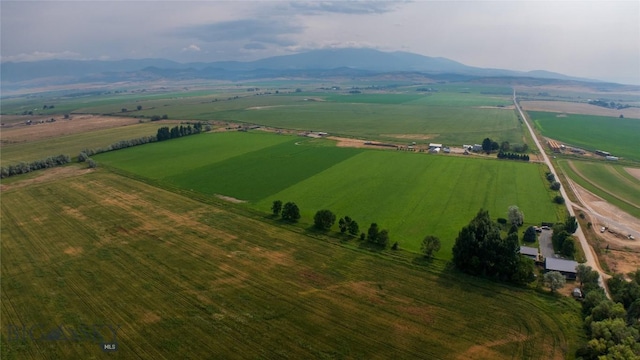 drone / aerial view with a mountain view and a rural view