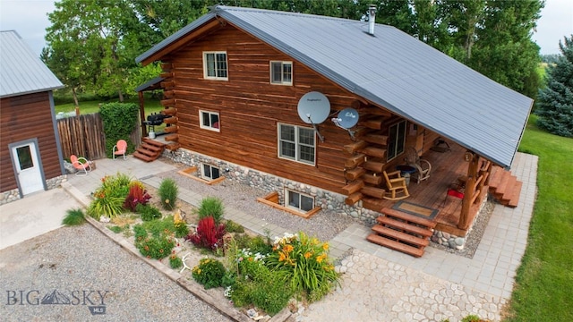 rear view of house with a patio