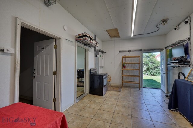 interior space featuring light tile patterned flooring