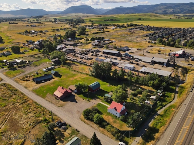 drone / aerial view featuring a mountain view