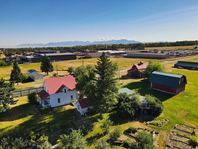 drone / aerial view featuring a mountain view