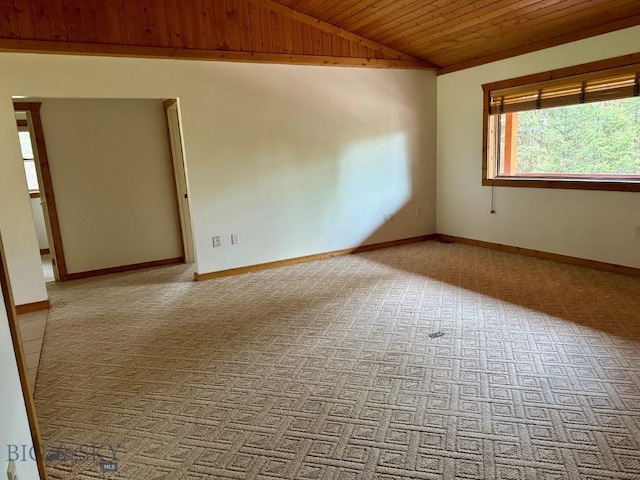 unfurnished room with wooden ceiling, lofted ceiling, and light carpet