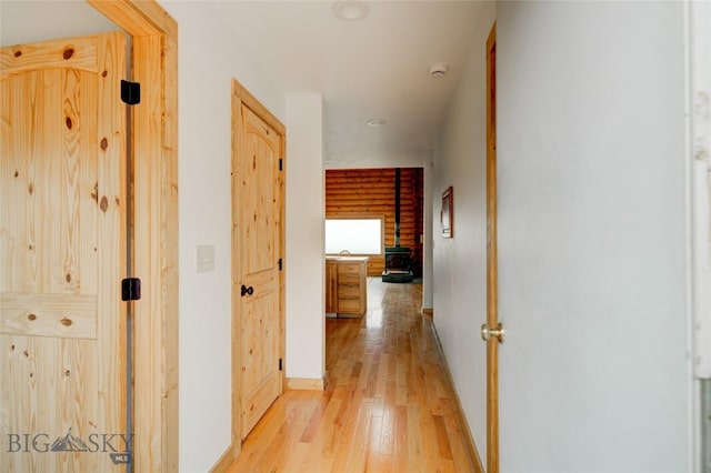 224 Slide Rock Rd, Cameron, MT 59720 - corridor featuring light wood-style floors and baseboards