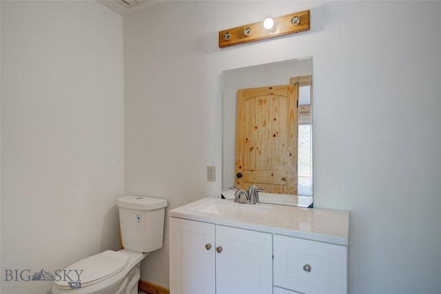 224 Slide Rock Rd, Cameron, MT 59720 - half bathroom featuring vanity and toilet