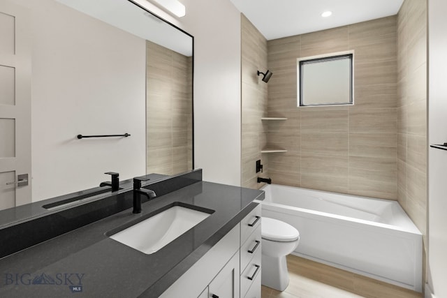 20 Bold Driver Ln, Bozeman, MT 59718 - full bath featuring toilet, tub / shower combination, vanity, wood finished floors, and recessed lighting